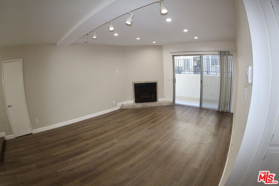 Empty room, Fireplace, Interior, Recessed Lighting, Wood Texture Flooring