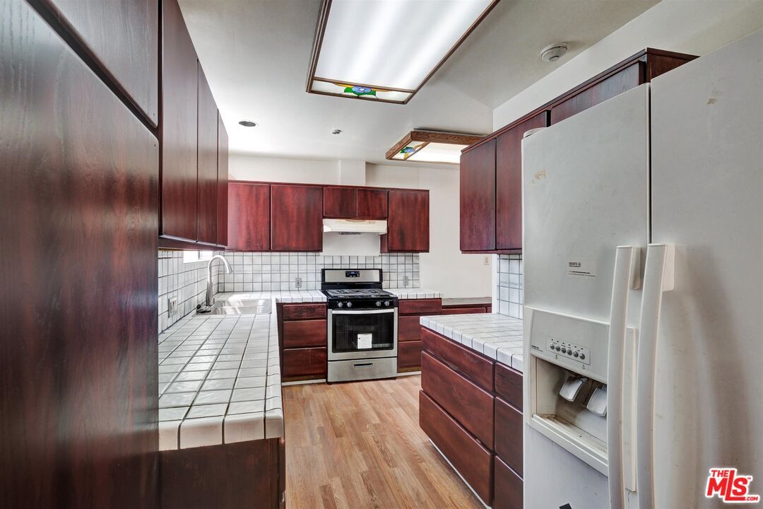 Interior, Kitchen, Tile Countertops, Wood Texture Flooring