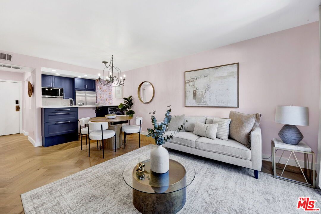 Chandelier, Dining room, Interior, Kitchen, Living room, Pendant Lights, Recessed Lighting, Stainless Steel Appliances, Wood Texture Flooring