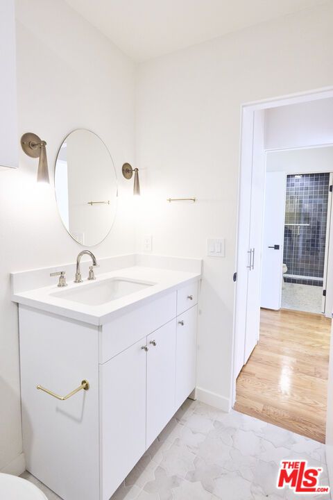Bathroom, Dual Sink Vanities, Interior, Marble, Wood Texture Flooring