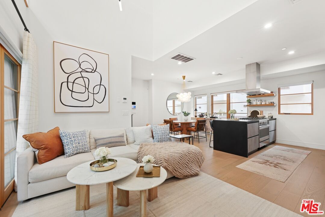 Chandelier, Dining room, Interior, Kitchen, Living room, Recessed Lighting, Stainless Steel Appliances, Wood Texture Flooring