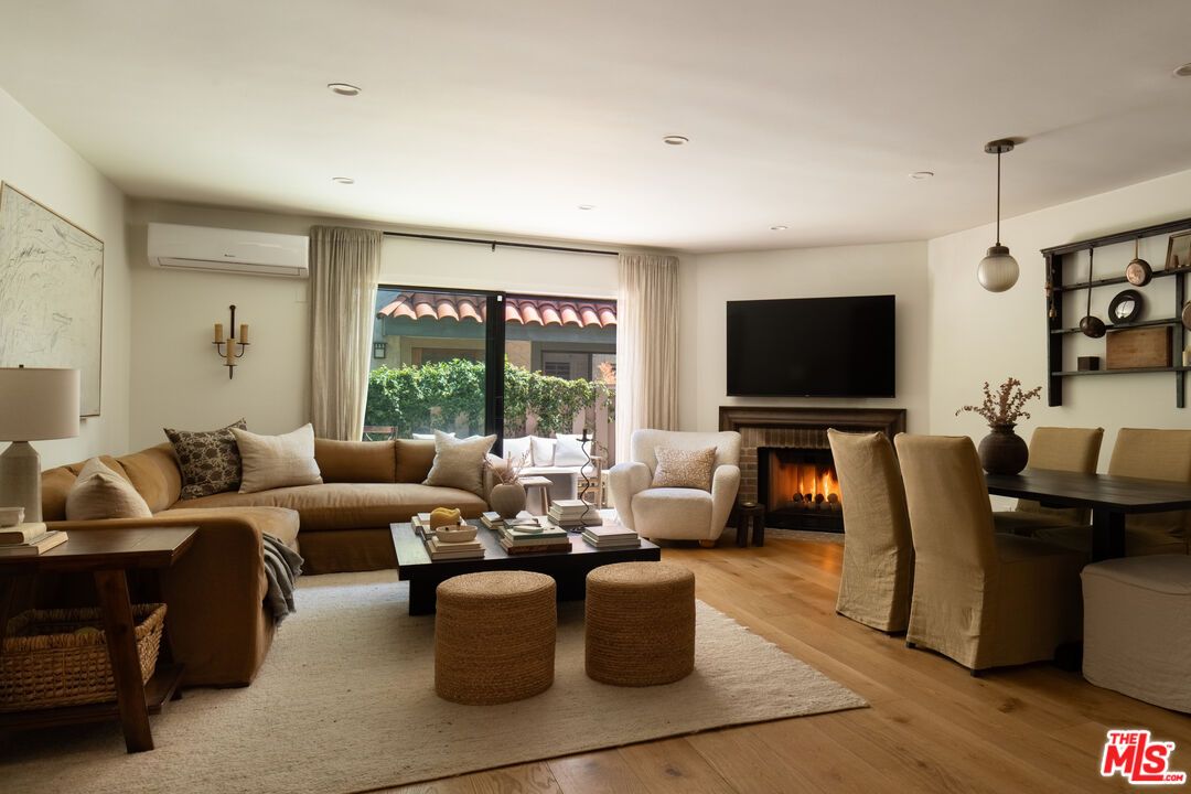 Dining room, Fireplace, Interior, Living room, Pendant Lights, Recessed Lighting, Wood Texture Flooring