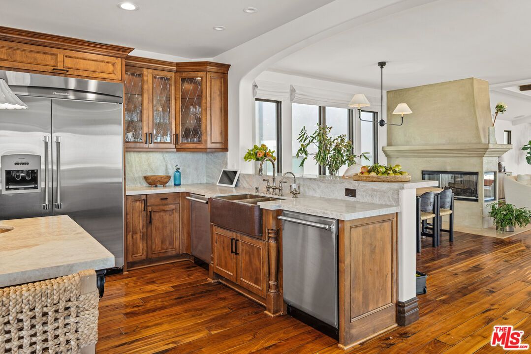 Fireplace, Interior, Kitchen, Pendant Lights, Recessed Lighting, Stainless Steel Appliances, Wood Texture Flooring