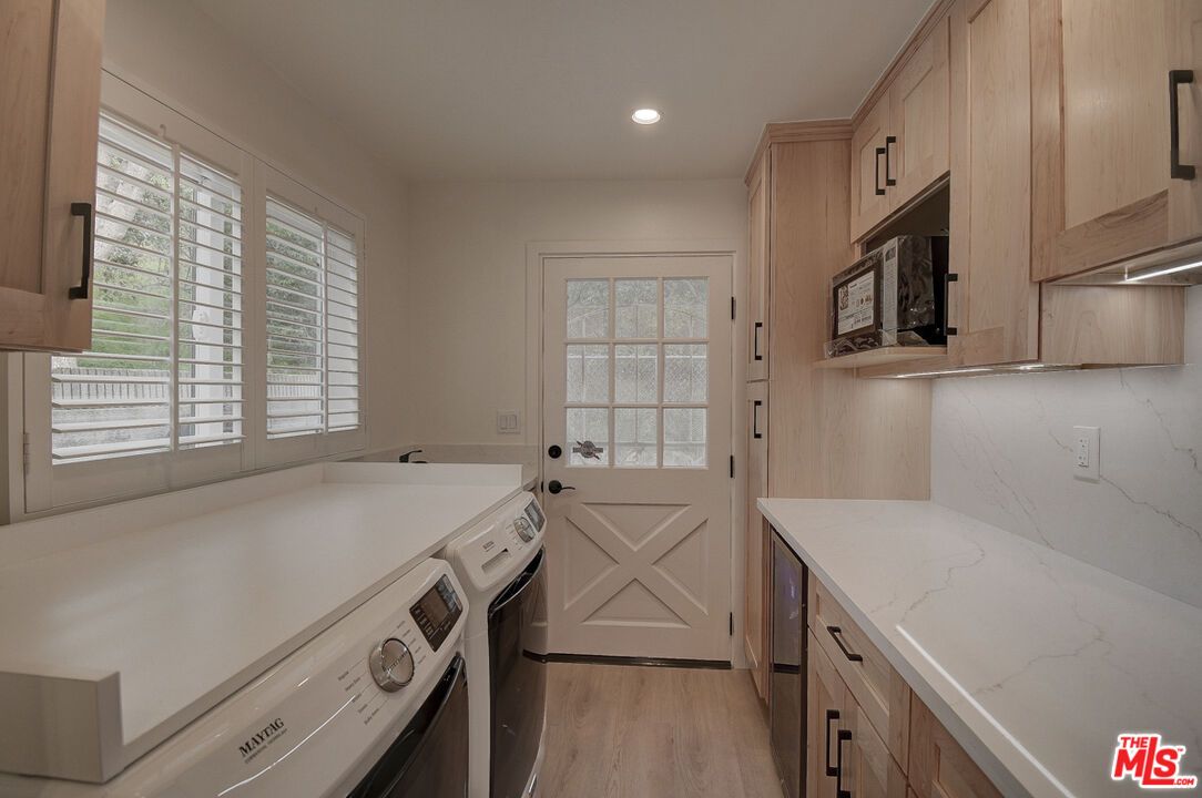 Interior, Kitchen, Recessed Lighting, Washer, Wood Texture Flooring