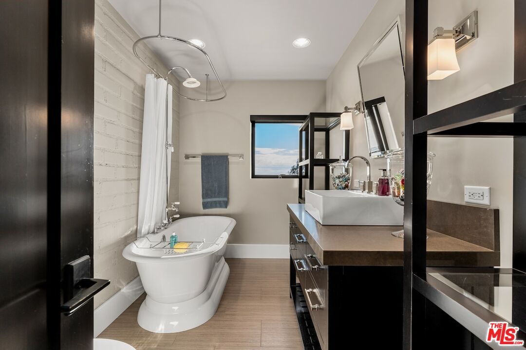 Bathroom, Free Standing Baths, Interior, Pendant Lights, Recessed Lighting, Wood Texture Flooring