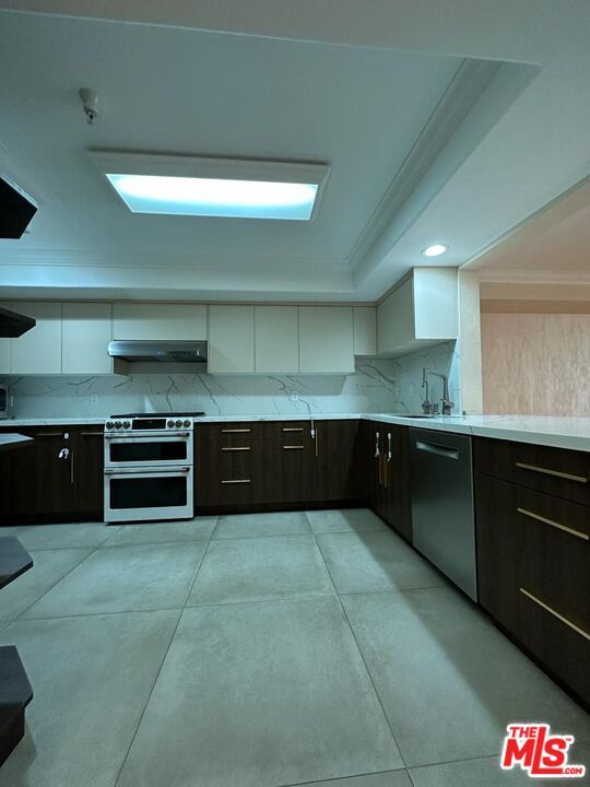 Interior, Kitchen, Marble Walls, Recessed Lighting, Stainless Steel Appliances