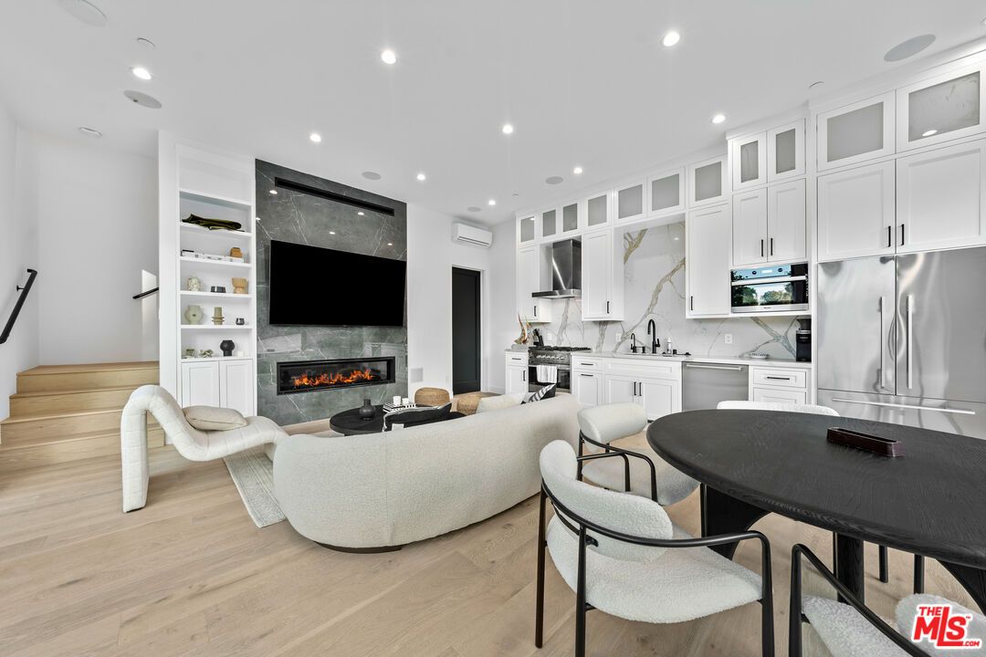 Fireplace, Interior, Kitchen, Living room, Marble Walls, Recessed Lighting, Wood Texture Flooring