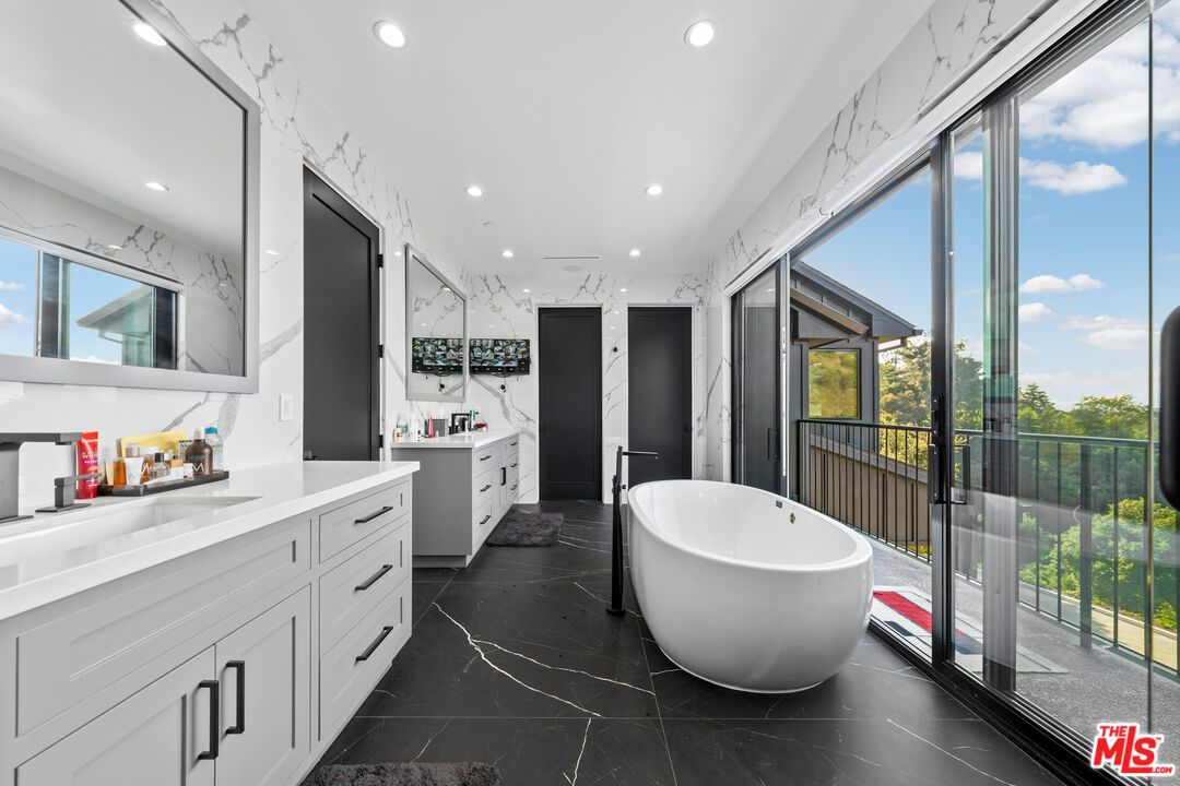 Bathroom, Dual Sink Vanities, Free Standing Baths, Interior, Marble, Marble Walls, Recessed Lighting