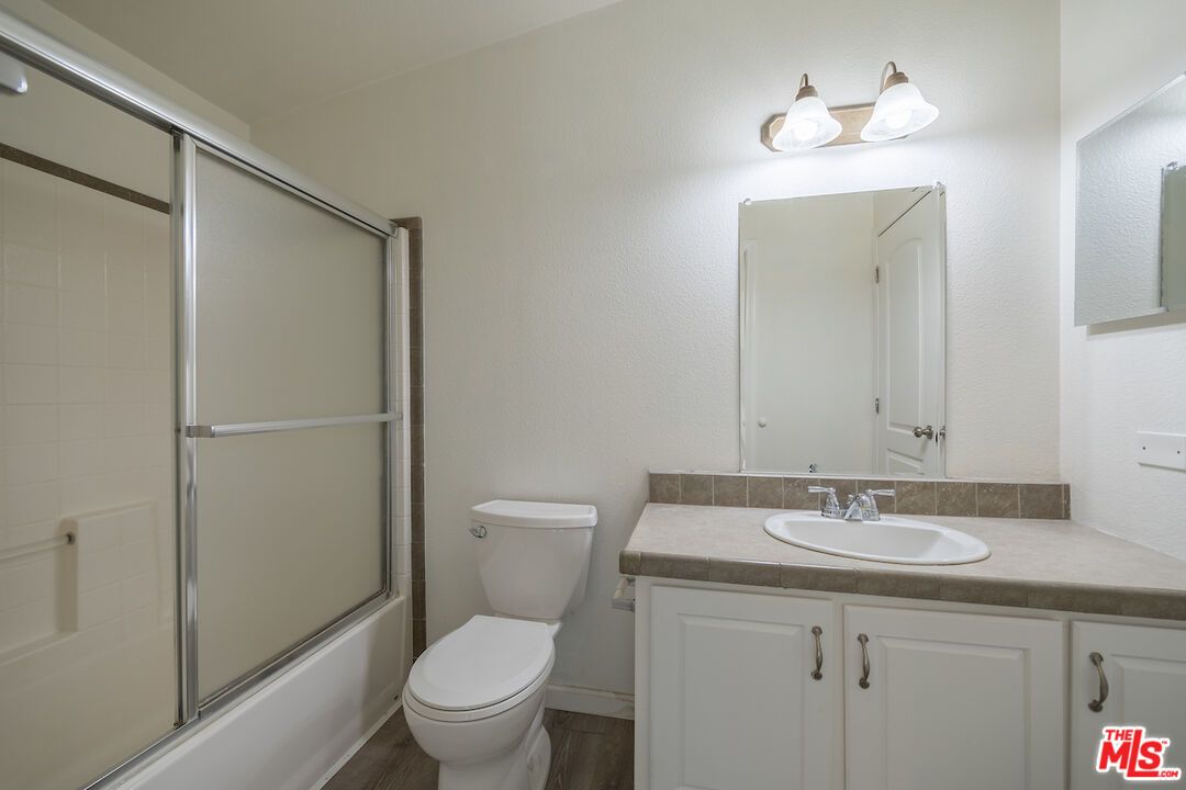 Bathroom, Glass Shower, Interior, Tile Countertops, Wood Texture Flooring