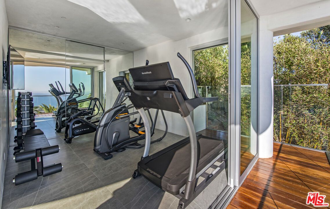 Fitness Equipment, Gym, Interior, Recessed Lighting, Water, Wood Texture Flooring