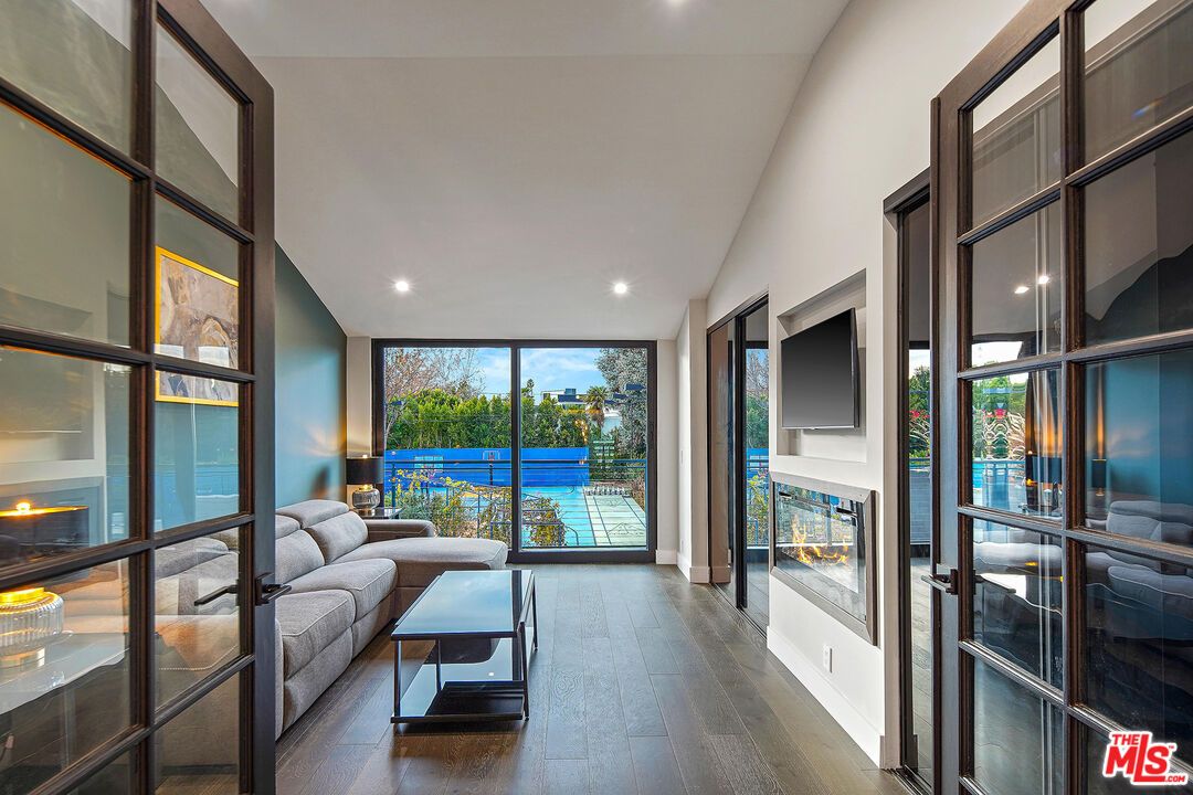 Fireplace, Interior, Recessed Lighting, Water, Wood Texture Flooring