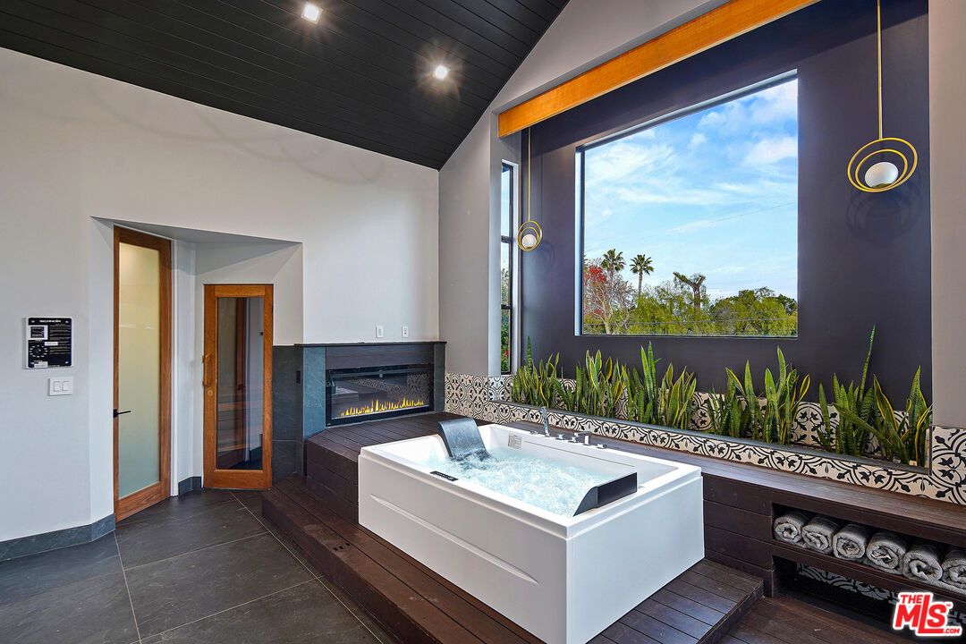 Fireplace, Hot Tub, Interior, Recessed Lighting, Wood Texture Flooring