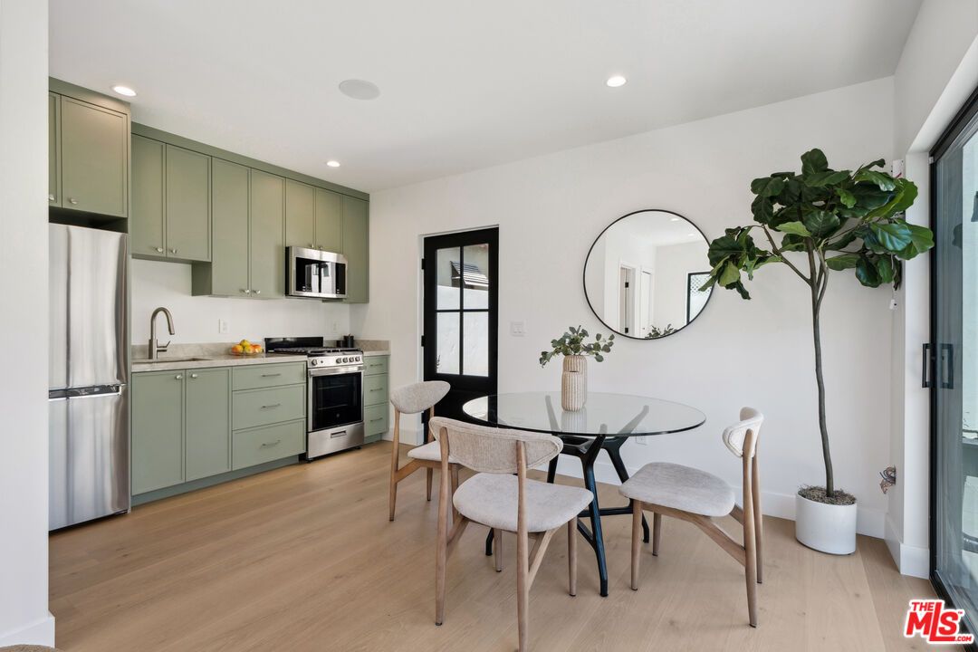 Dining room, Interior, Kitchen, Recessed Lighting, Stainless Steel Appliances, Wood Texture Flooring