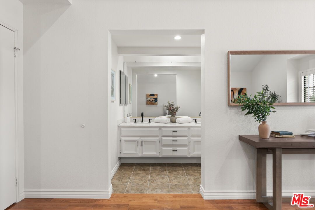Bathroom, Dual Sink Vanities, Interior, Recessed Lighting, Wood Texture Flooring