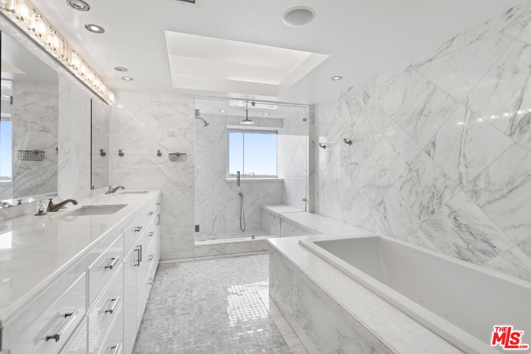 Bathroom, Dual Sink Vanities, Glass Shower, Interior, Marble, Marble Walls, Recessed Lighting