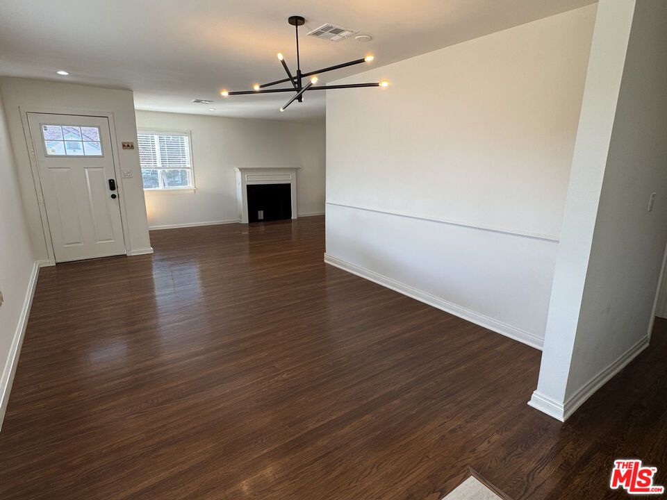 Empty room, Fireplace, Interior, Pendant Lights, Recessed Lighting, Wood Texture Flooring