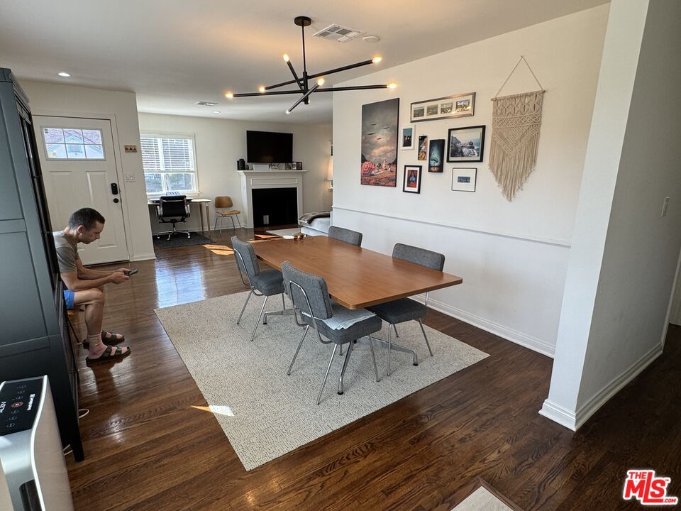 Dining room, Fireplace, Interior, Pendant Lights, Recessed Lighting, Wood Texture Flooring