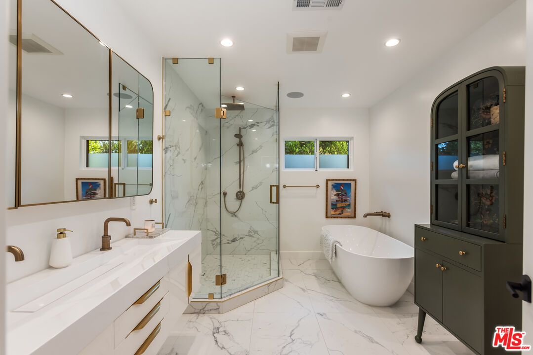 Bathroom, Dual Sink Vanities, Free Standing Baths, Glass Shower, Interior, Marble, Marble Walls, Recessed Lighting