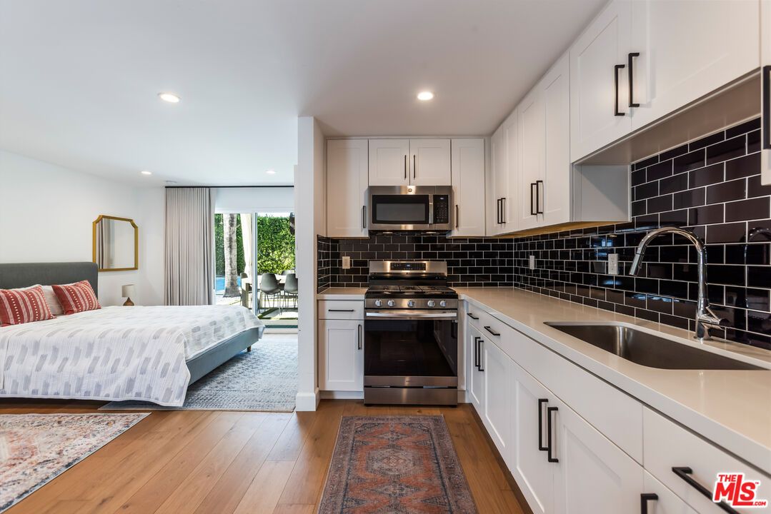 Bedroom, Interior, Kitchen, Recessed Lighting, Stainless Steel Appliances, Wood Texture Flooring