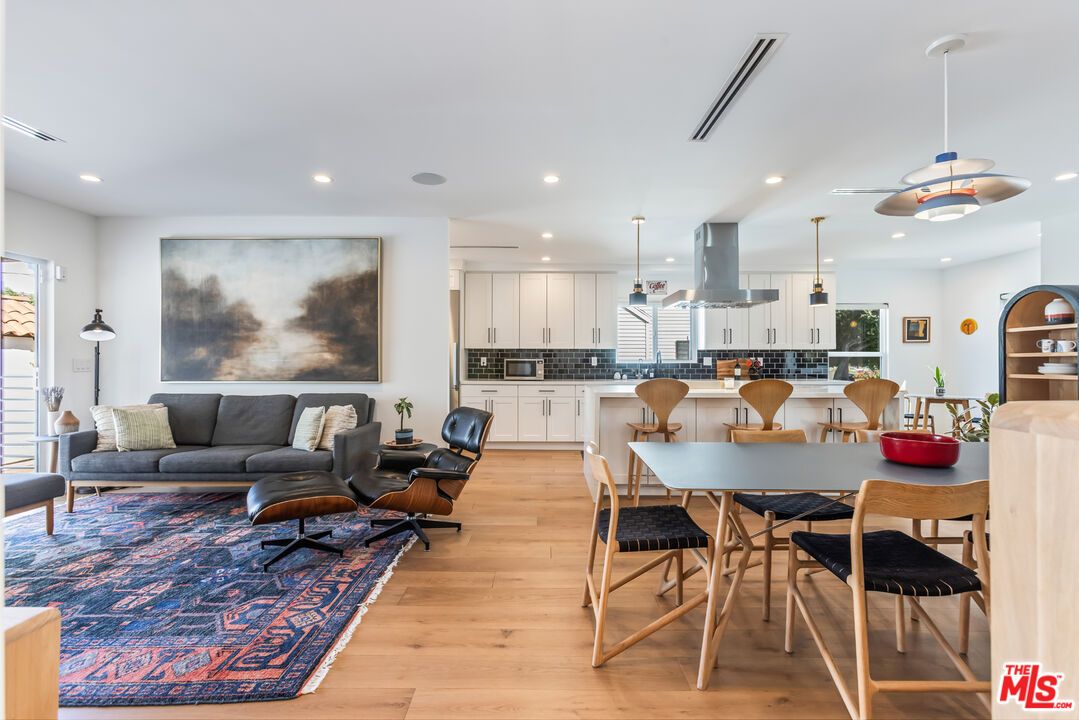 Dining room, Interior, Kitchen, Living room, Pendant Lights, Recessed Lighting, Stainless Steel Appliances, Wood Texture Flooring