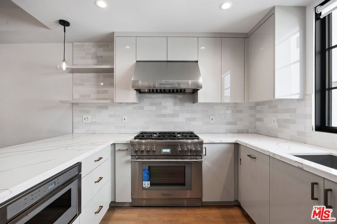 Interior, Kitchen, Pendant Lights, Recessed Lighting, Stainless Steel Appliances, Wood Texture Flooring