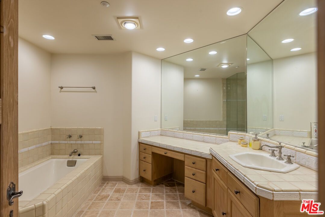 Bathroom, Dual Sink Vanities, Interior, Recessed Lighting, Tile Countertops