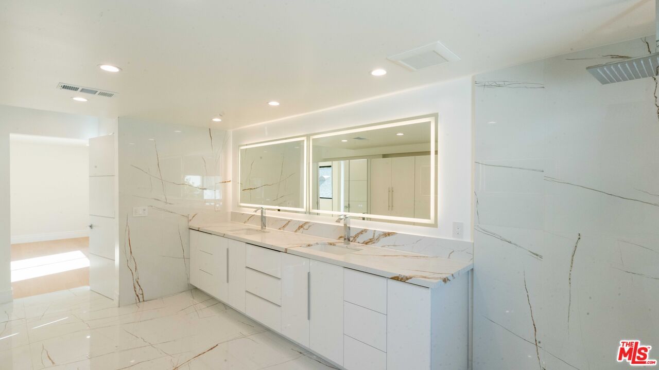 Bathroom, Dual Sink Vanities, Interior, Marble, Marble Walls, Recessed Lighting