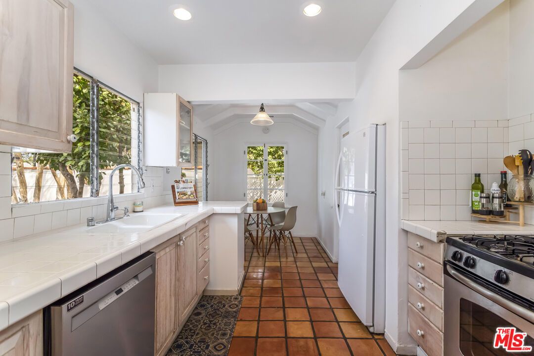 Dining room, Interior, Kitchen, Pendant Lights, Recessed Lighting, Stainless Steel Appliances, Tile Countertops