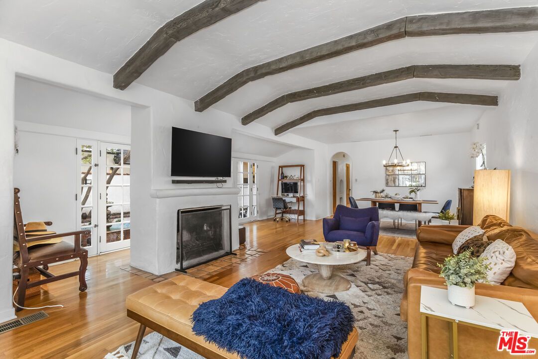 Chandelier, Dining room, Fireplace, Interior, Living room, Pendant Lights, Wooden Beams, Wood Texture Flooring