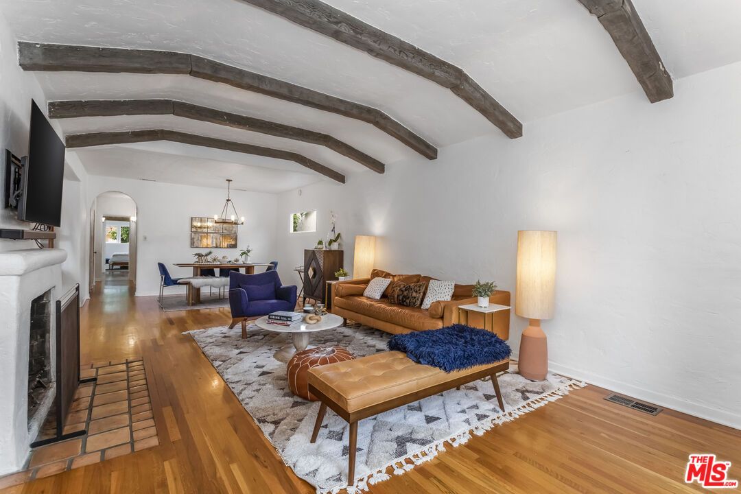 Chandelier, Dining room, Fireplace, Interior, Living room, Pendant Lights, Wooden Beams, Wood Texture Flooring