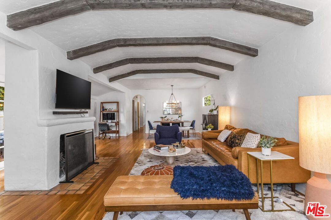 Chandelier, Dining room, Fireplace, Interior, Living room, Pendant Lights, Wooden Beams, Wood Texture Flooring