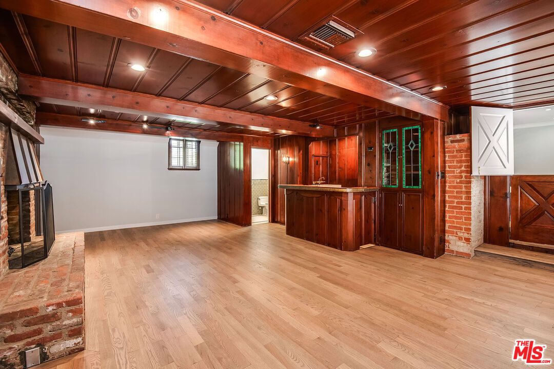 Empty room, Fireplace, Interior, Recessed Lighting, Stone Walls, Wooden Beams, Wooden Ceilings, Wood Texture Flooring, Wooden Walls