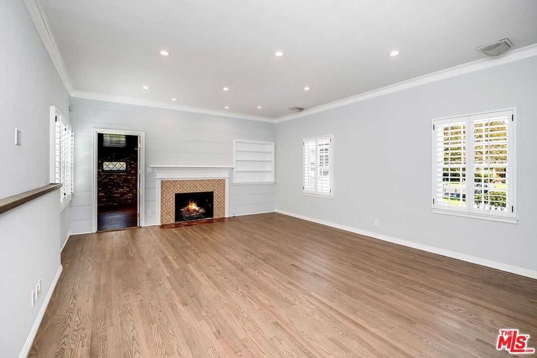 Empty room, Fireplace, Interior, Recessed Lighting, Wood Texture Flooring