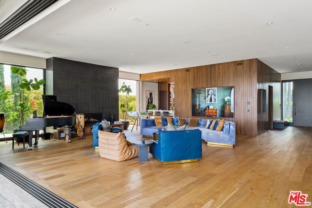 Fireplace, Interior, Living room, Piano, Recessed Lighting, Wood Texture Flooring, Wooden Walls