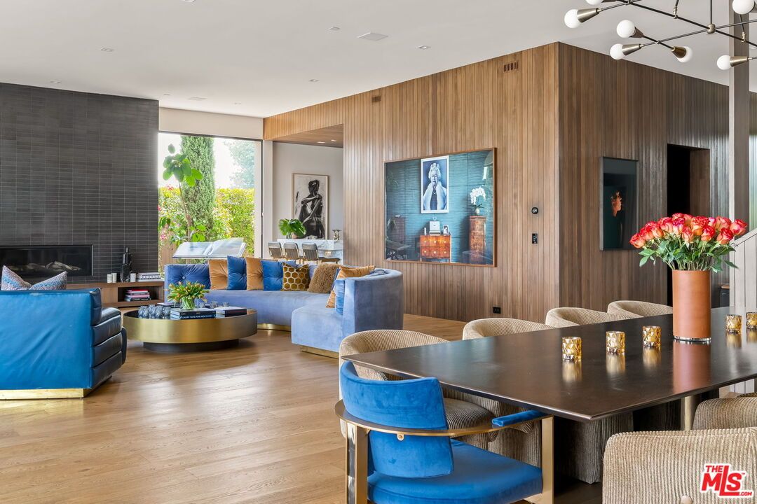 Dining room, Fireplace, Interior, Living room, Pendant Lights, Recessed Lighting, Wood Texture Flooring, Wooden Walls