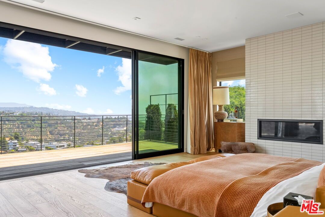 Bedroom, Fireplace, Interior, Recessed Lighting, Wood Texture Flooring