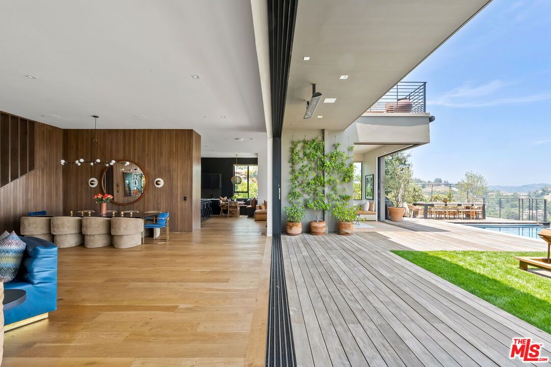 Exterior, Recessed Lighting, Wood Texture Flooring, Wooden Walls
