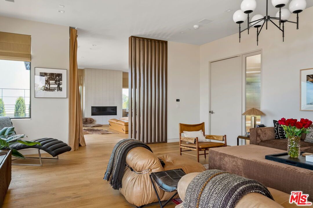 Chandelier, Fireplace, Interior, Living room, Recessed Lighting, Wood Texture Flooring