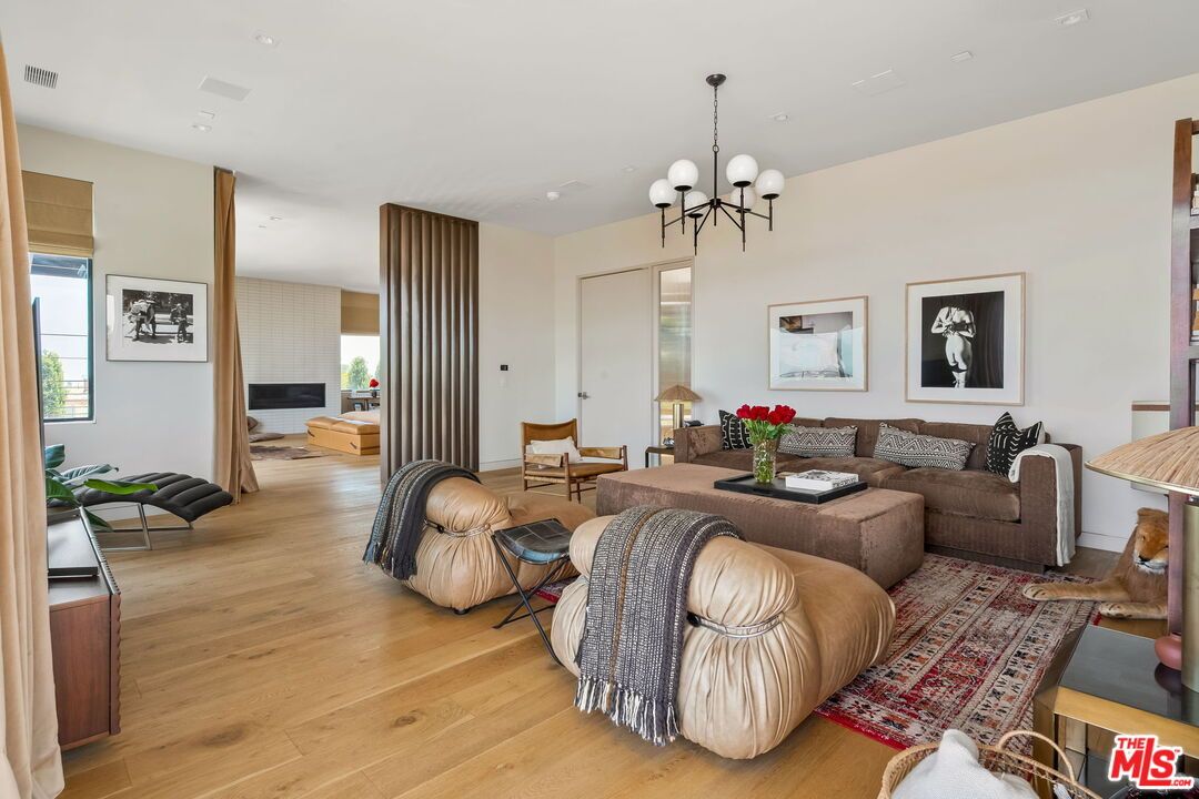 Chandelier, Fireplace, Interior, Living room, Recessed Lighting, Wood Texture Flooring