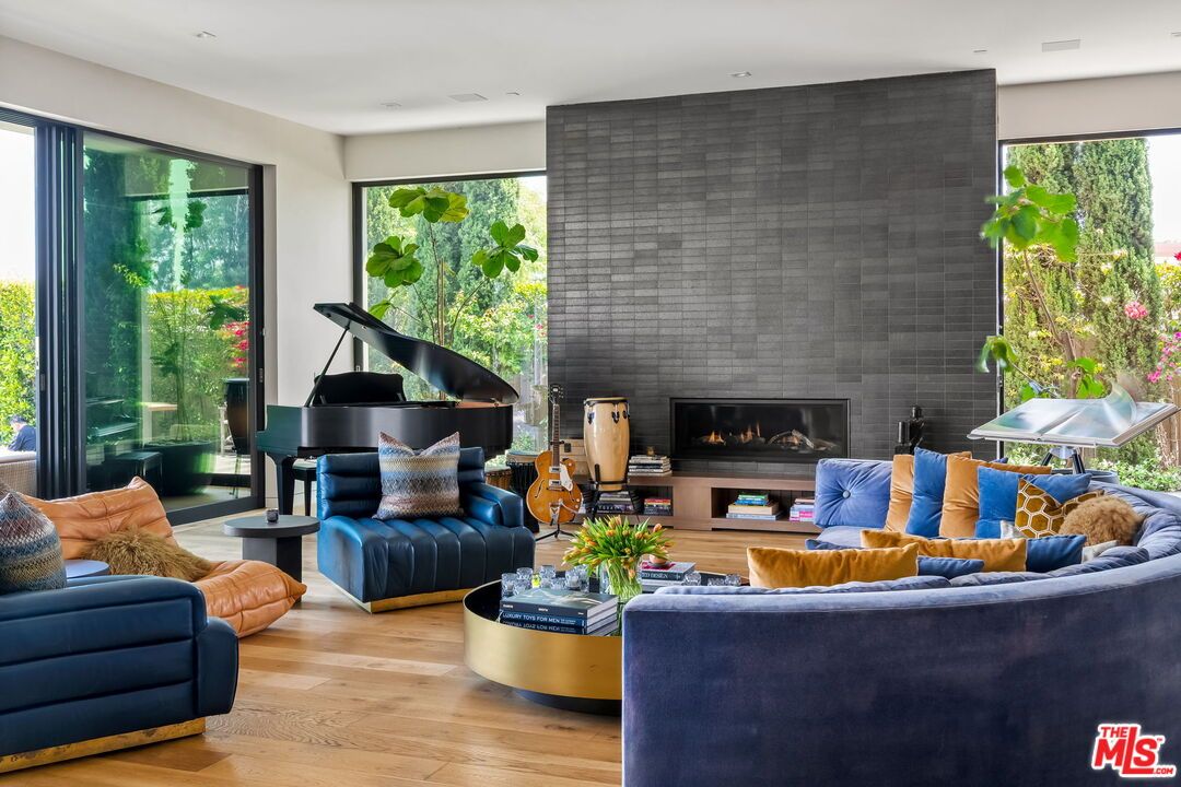 Fireplace, Interior, Living room, Piano, Recessed Lighting, Wood Texture Flooring