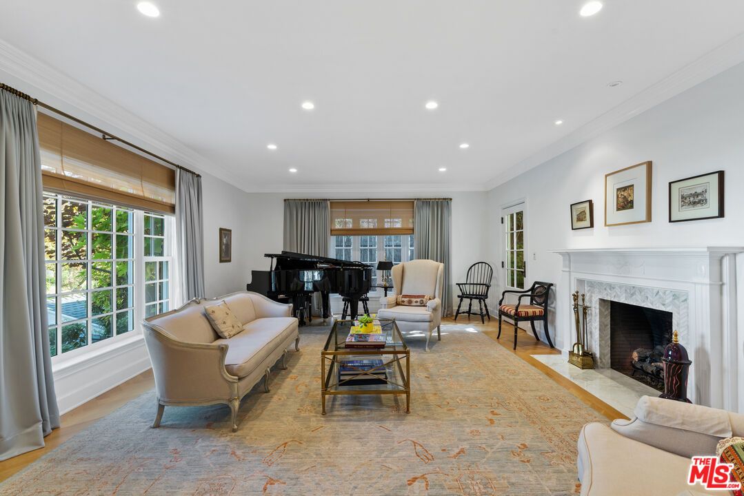 Fireplace, Interior, Living room, Piano, Recessed Lighting, Wood Texture Flooring