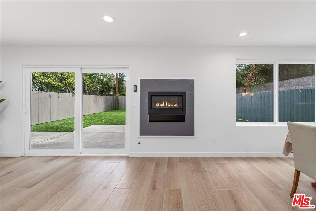 Empty room, Fireplace, Interior, Recessed Lighting, Wood Texture Flooring