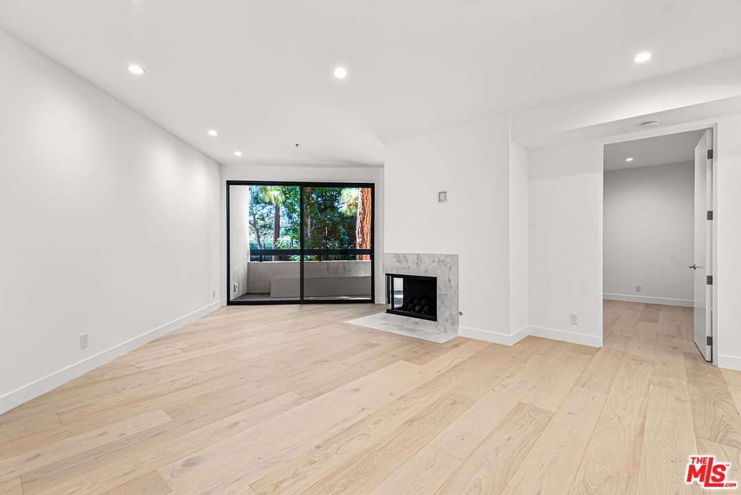 Empty room, Fireplace, Interior, Recessed Lighting, Wood Texture Flooring