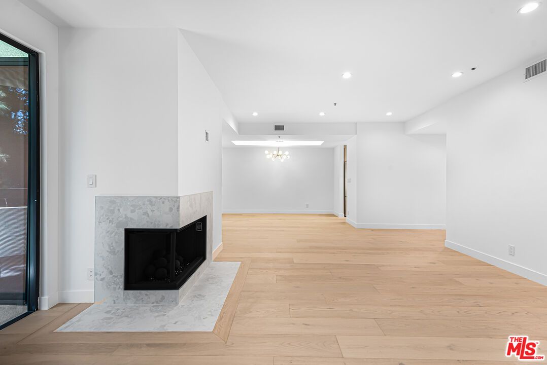 Empty room, Fireplace, Interior, Recessed Lighting, Wood Texture Flooring
