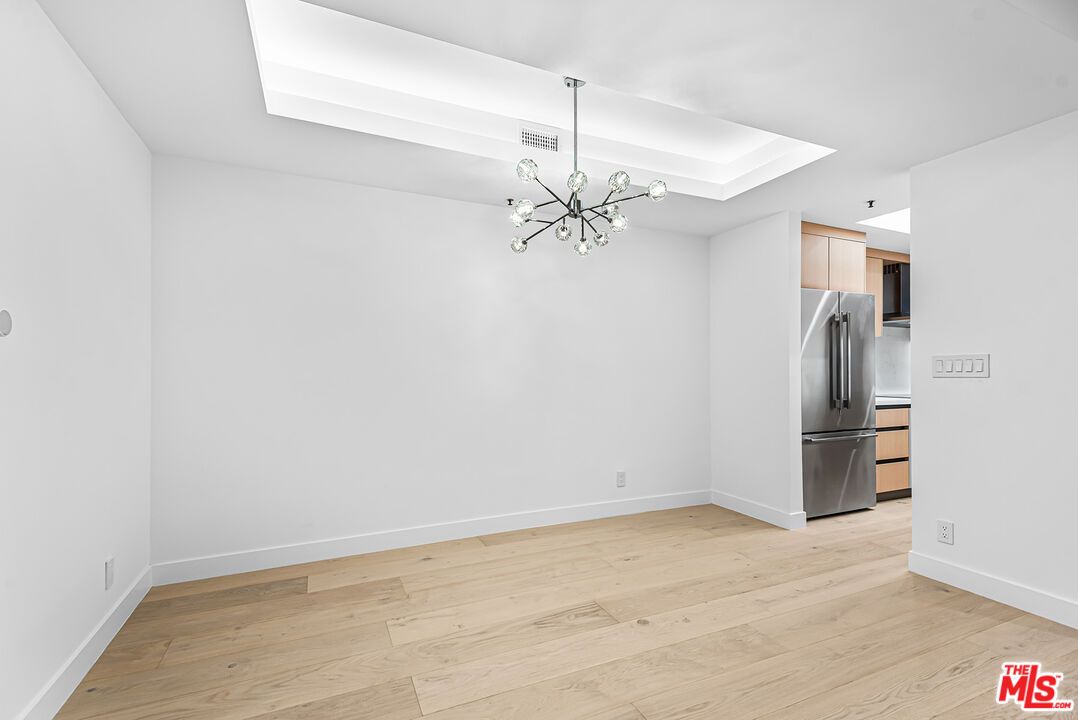Empty room, Interior, Kitchen, Pendant Lights, Stainless Steel Appliances, Wood Texture Flooring