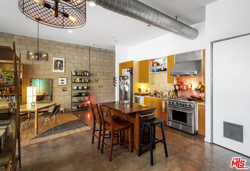 Dining room, Interior, Kitchen, Pendant Lights, Recessed Lighting, Stainless Steel Appliances, Stone Walls