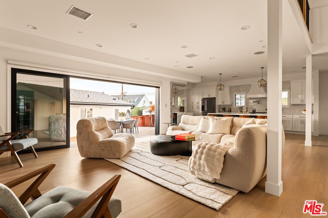 Dining room, Interior, Kitchen, Living room, Pendant Lights, Recessed Lighting, Stainless Steel Appliances, Wood Texture Flooring