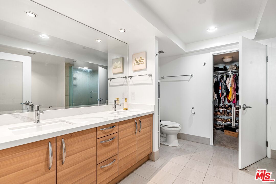 Bathroom, Dual Sink Vanities, Interior, Recessed Lighting, Walk-in Closets