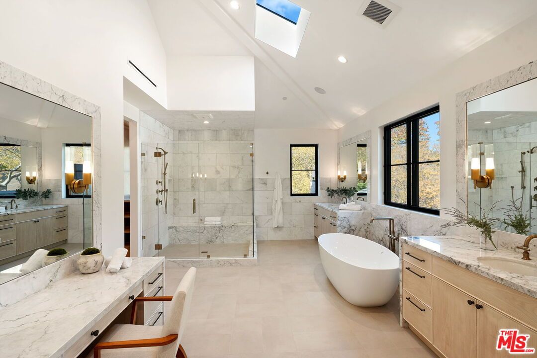 Bathroom, Dual Sink Vanities, Free Standing Baths, Glass Shower, Interior, Marble Walls, Recessed Lighting