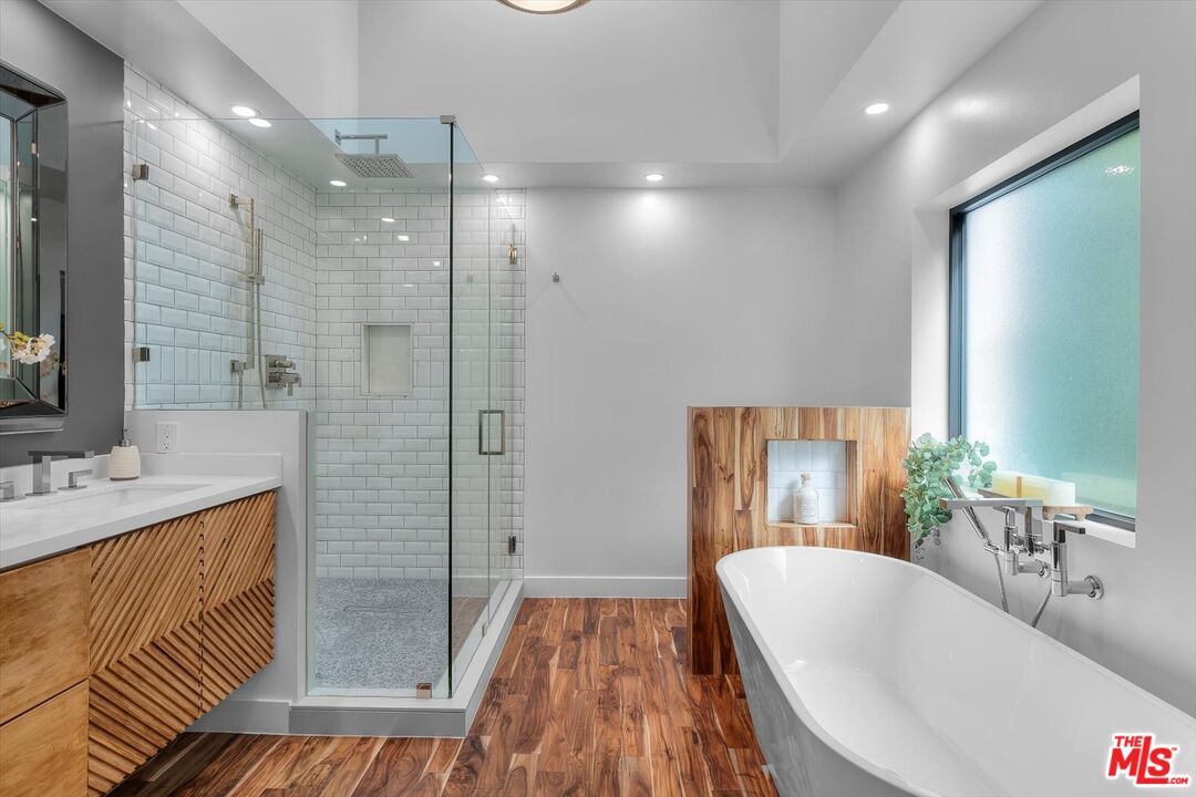 Bathroom, Dual Sink Vanities, Free Standing Baths, Glass Shower, Interior, Recessed Lighting, Wood Texture Flooring, Wooden Walls